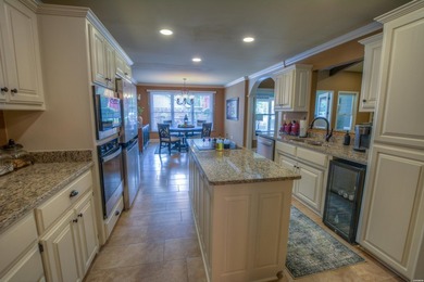 Wake up to lake views every morning in this beautifully updated - photo 12