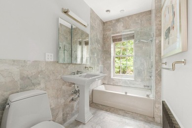 Now offered at $7,649,000, 506 East 87th Street presents a rare - photo 15