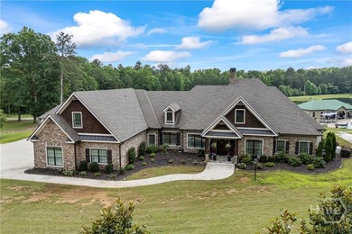 Thoughtfully designed around the ease of main-level living, this - photo 1