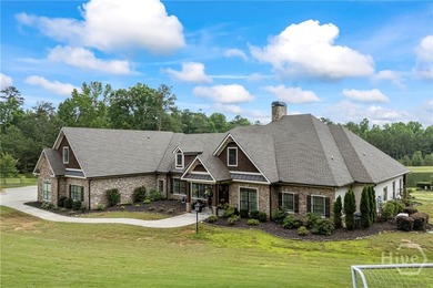 Thoughtfully designed around the ease of main-level living, this - photo 2