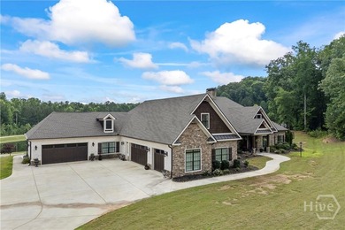 Thoughtfully designed around the ease of main-level living, this - photo 3