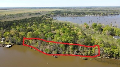 Discover a lake escape on this 1 AC plus lakefront lot with 416 - photo 2