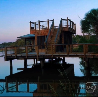 Over 19 acre paradise with a private island, bridge and dock - photo 5