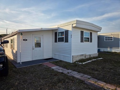 This 2 bed 1 bath home is located in The Park On 46th a 55+ - photo 1