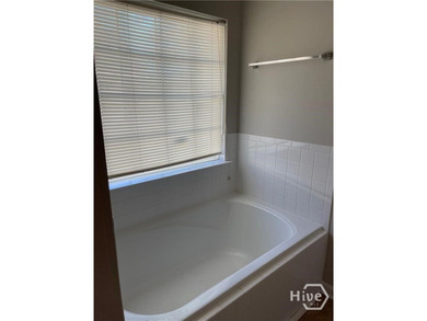 Welcome to this charming 4 bedroom, 2 bath home located in the - photo 7