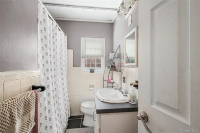 Charming Cape-style home in Merrick offering warmth, character - photo 11