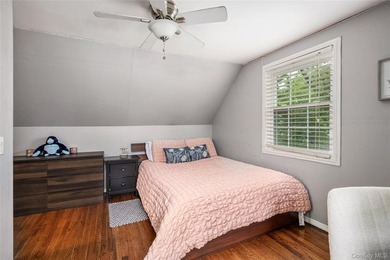 Charming Cape-style home in Merrick offering warmth, character - photo 16