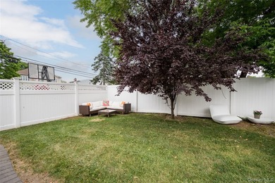 Charming Cape-style home in Merrick offering warmth, character - photo 22