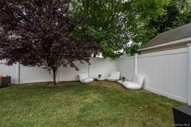 Charming Cape-style home in Merrick offering warmth, character - photo 23