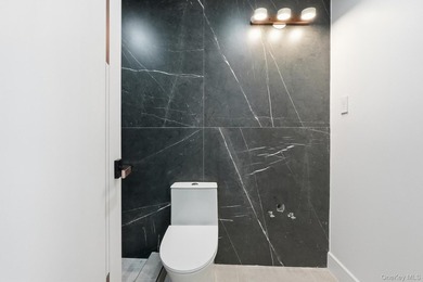 Fully renovated one family home. This extra modern home is - photo 13