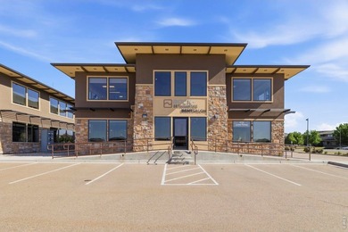 Centrally located 1,579 SF executive office condo featuring - photo 1