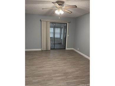 Great Location! This unique single level end unit townhome has - photo 16
