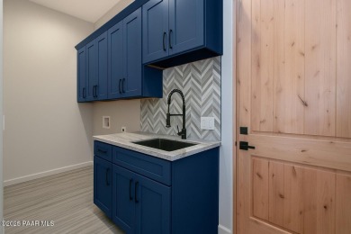 New construction by McBrothers Custom Homes in the gated