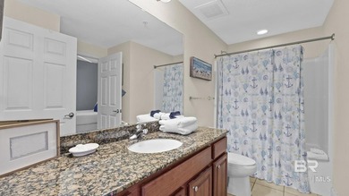 Set on the 18th floor, this 2-bedroom, 2-bath residence offers a - photo 21