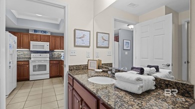 Set on the 18th floor, this 2-bedroom, 2-bath residence offers a - photo 22