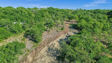 This 1.29-acre lot in Thompson Heights blends elevation, privacy - photo 11