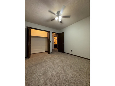 Welcome to 909 Crescent Drive in Ness City, where space, comfort - photo 24