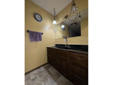 Welcome to 909 Crescent Drive in Ness City, where space, comfort - photo 32