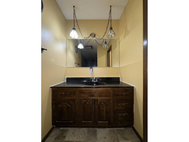 Welcome to 909 Crescent Drive in Ness City, where space, comfort - photo 33