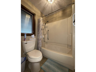 Welcome to 909 Crescent Drive in Ness City, where space, comfort - photo 35