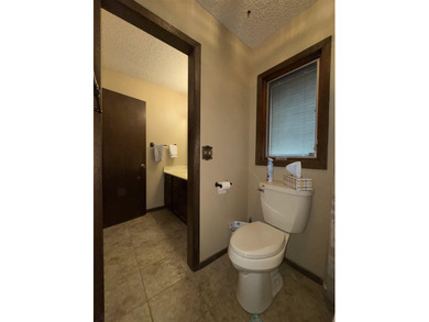 Welcome to 909 Crescent Drive in Ness City, where space, comfort - photo 36