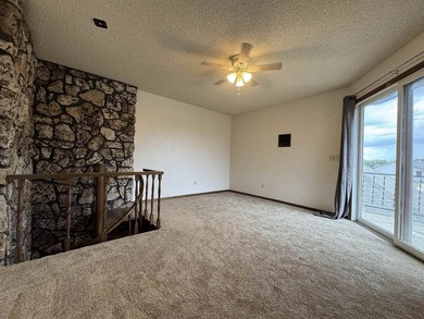Welcome to 909 Crescent Drive in Ness City, where space, comfort - photo 47