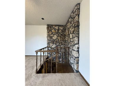 Welcome to 909 Crescent Drive in Ness City, where space, comfort - photo 49