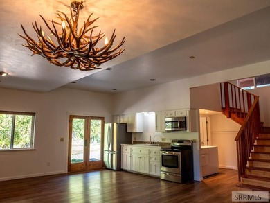 Nestled against the base of the hillside with an expansive view - photo 29