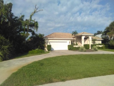 This charming 3-bedroom, 2-bathroom Florida pool home sits on - photo 2