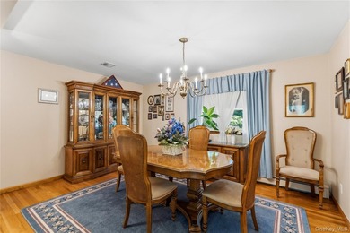 Nestled on a quiet cul-de-sac in one of East Setauket's most - photo 12