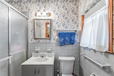 Nestled on a quiet cul-de-sac in one of East Setauket's most - photo 26