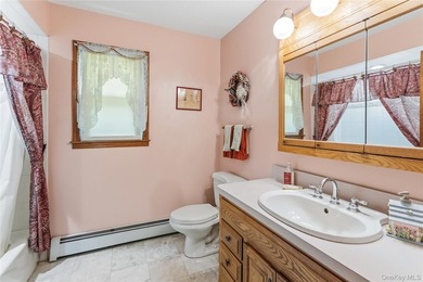 Nestled on a quiet cul-de-sac in one of East Setauket's most - photo 29