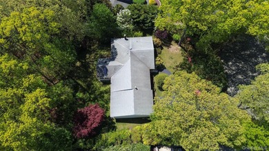 Nestled on a quiet cul-de-sac in one of East Setauket's most - photo 38