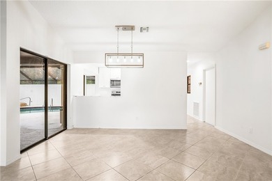 Sophistication meets the shoreline in this renovated modern pool - photo 11