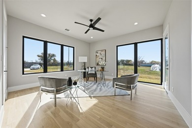 Located in a small, upscale gated community, this contemporary - photo 17