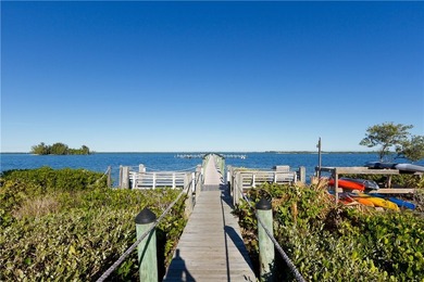 Sophistication meets the shoreline in this renovated modern pool - photo 36