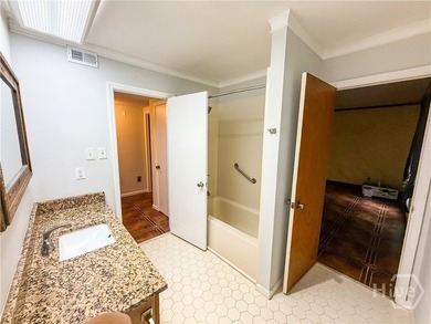 Well-built and well-maintained, this 4-bedroom, 2-bath lakefront - photo 8