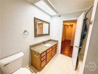 Well-built and well-maintained, this 4-bedroom, 2-bath lakefront - photo 9