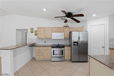 This move-in ready 3-bed + Den, 2-bath home sits on over 1 acre - photo 11
