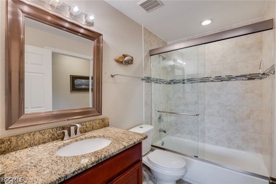 This second-floor condo is bright, open, and easy to maintain - photo 12