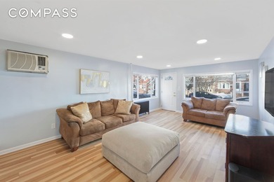 Bathed in natural light from its northeast exposure, this - photo 1