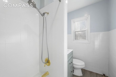Bathed in natural light from its northeast exposure, this - photo 7