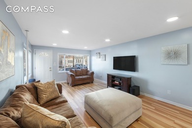 Bathed in natural light from its northeast exposure, this - photo 10