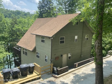 Come enjoy this Norris Lake cabin with soaring pine cathedral - Lake Home For Sale in Speedwell, Tennessee