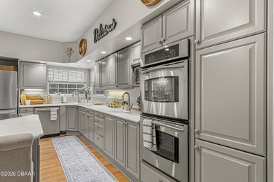 Tucked away on over an acre of beautifully wooded privacy, this - photo 16