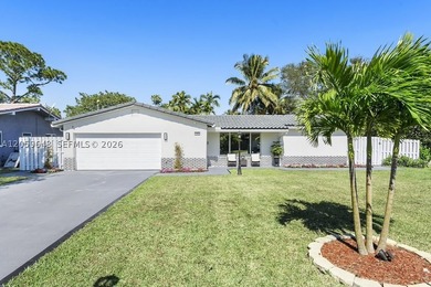 Completely renovated and move-in ready! This stunning 3-bedroom - photo 1