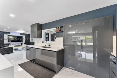 Completely renovated and move-in ready! This stunning 3-bedroom - photo 6