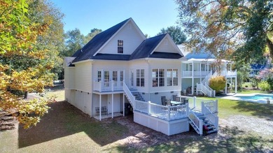 This charming lakefront cottage has new HVAC units and was built - photo 2