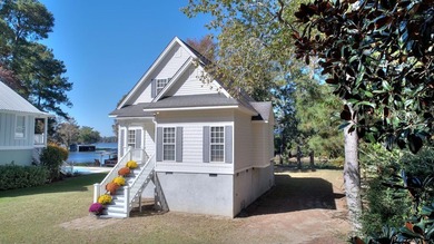 This charming lakefront cottage has new HVAC units and was built - photo 5