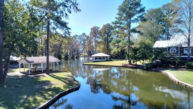 This charming lakefront cottage has new HVAC units and was built - photo 6